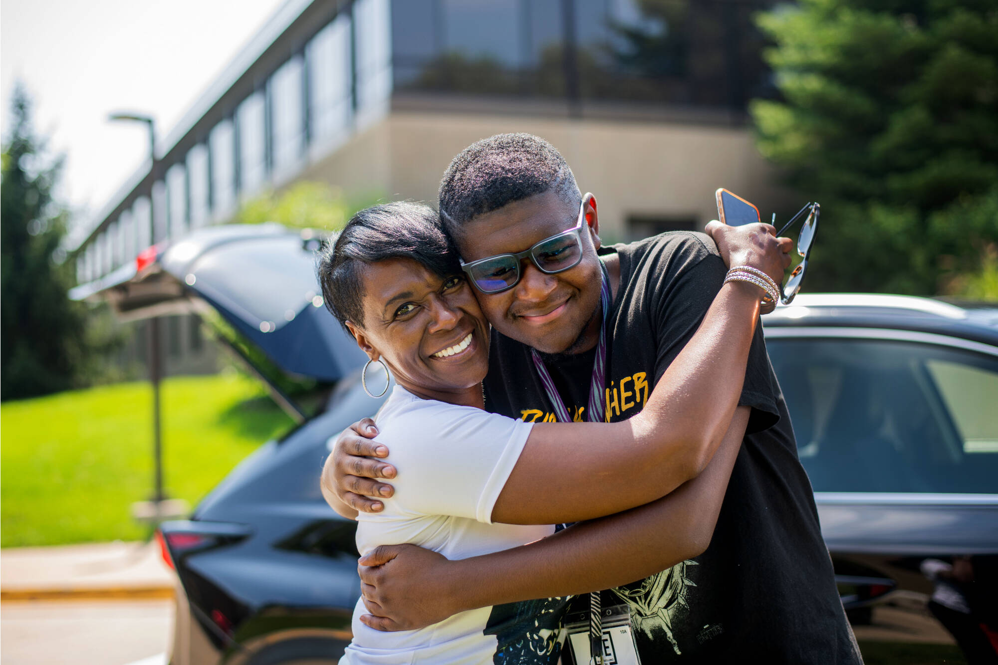 Linda Williams, left, hugs her son Joseph Williams, of Southfield, as she says goodbye after helping Joseph move into GVSU’s Allendale Campus August 20.